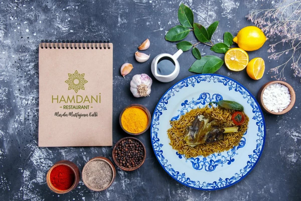 Hamdani Restaurant — logo not defteri ve yöresel tabak